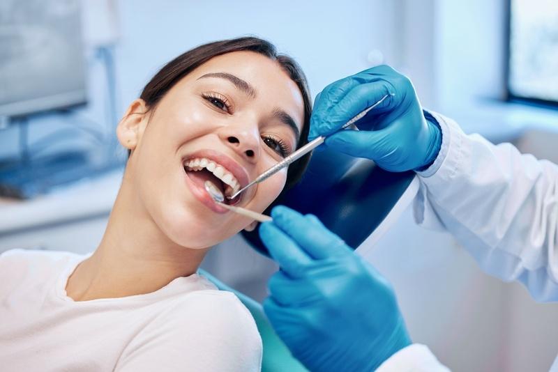 A lady getting a Gulfton Smiles Dental Cleaning